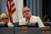 Joseph Komrosky speaks during a school board meeting.