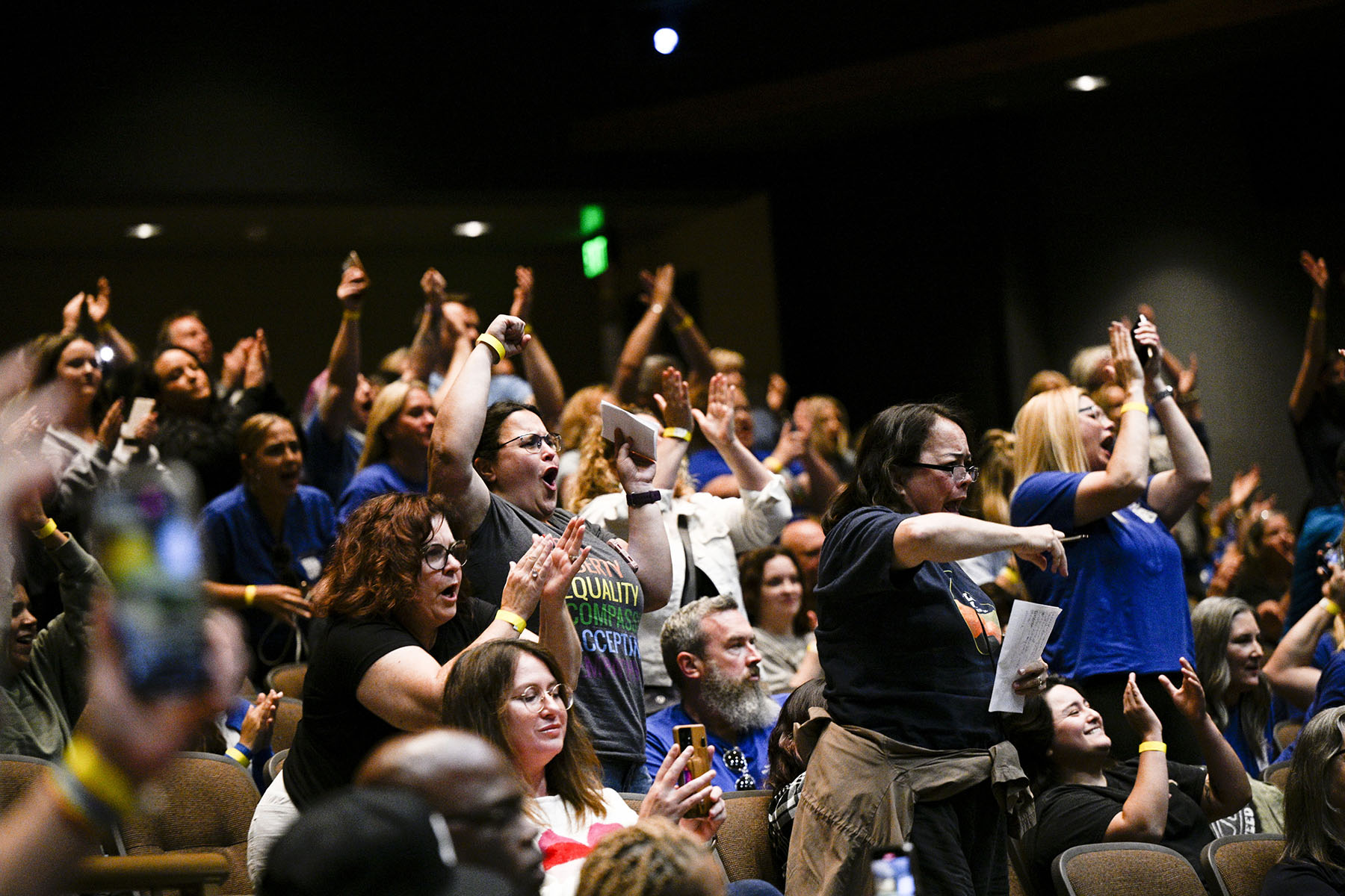 Members of The Temecula Valley Educators Association, students, and parents of the district cheer in support of keeping Temecula Valley Unified School District Superintendent, Jodi McClay on the board at Temecula Valley High School.