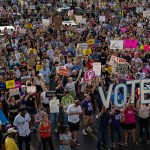 Letters forming the word VOTE are seen as abortion rights activists protest outside the Planned Parenthood Reproductive Health Services Center after the overturning of Roe v Wade by the Supreme Court.