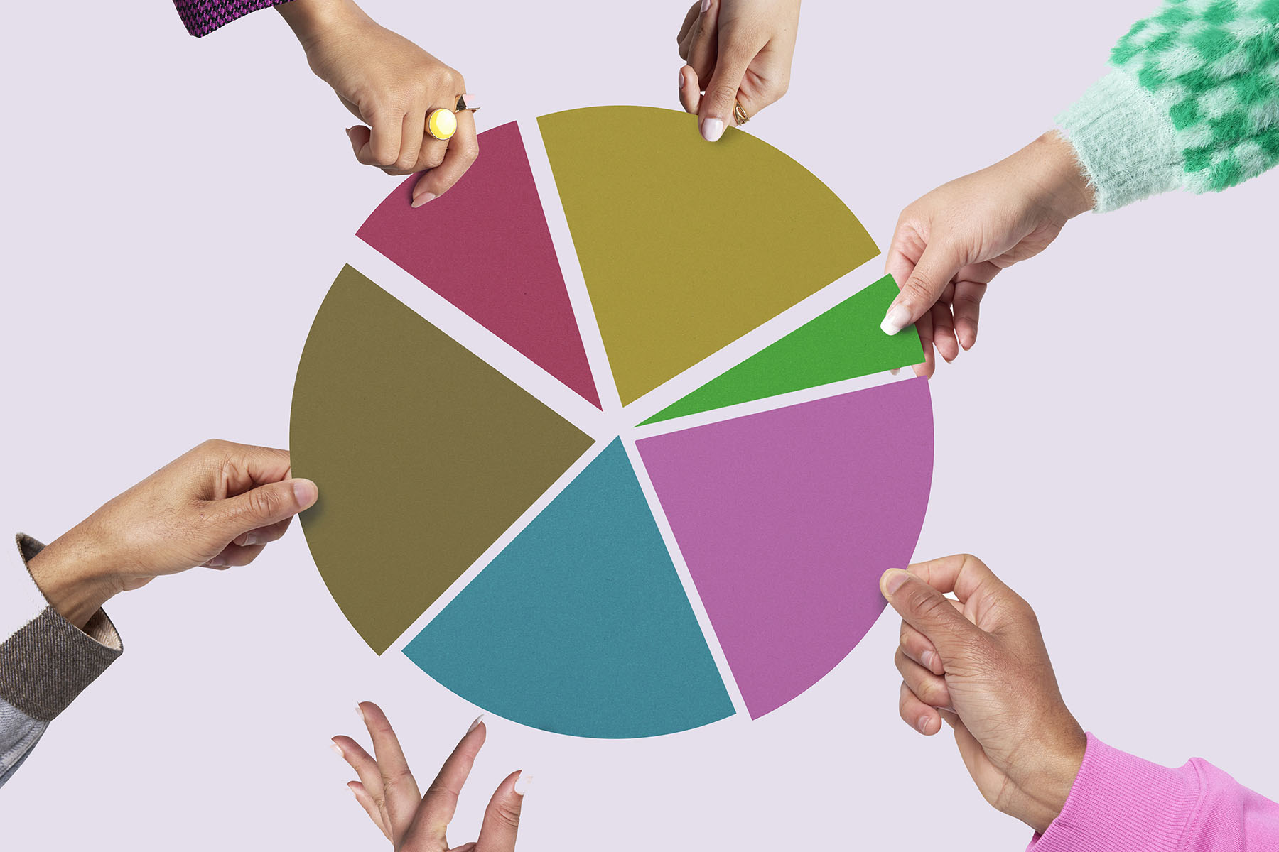 Collage image of a group of people's hands removing pieces of a pie chart.