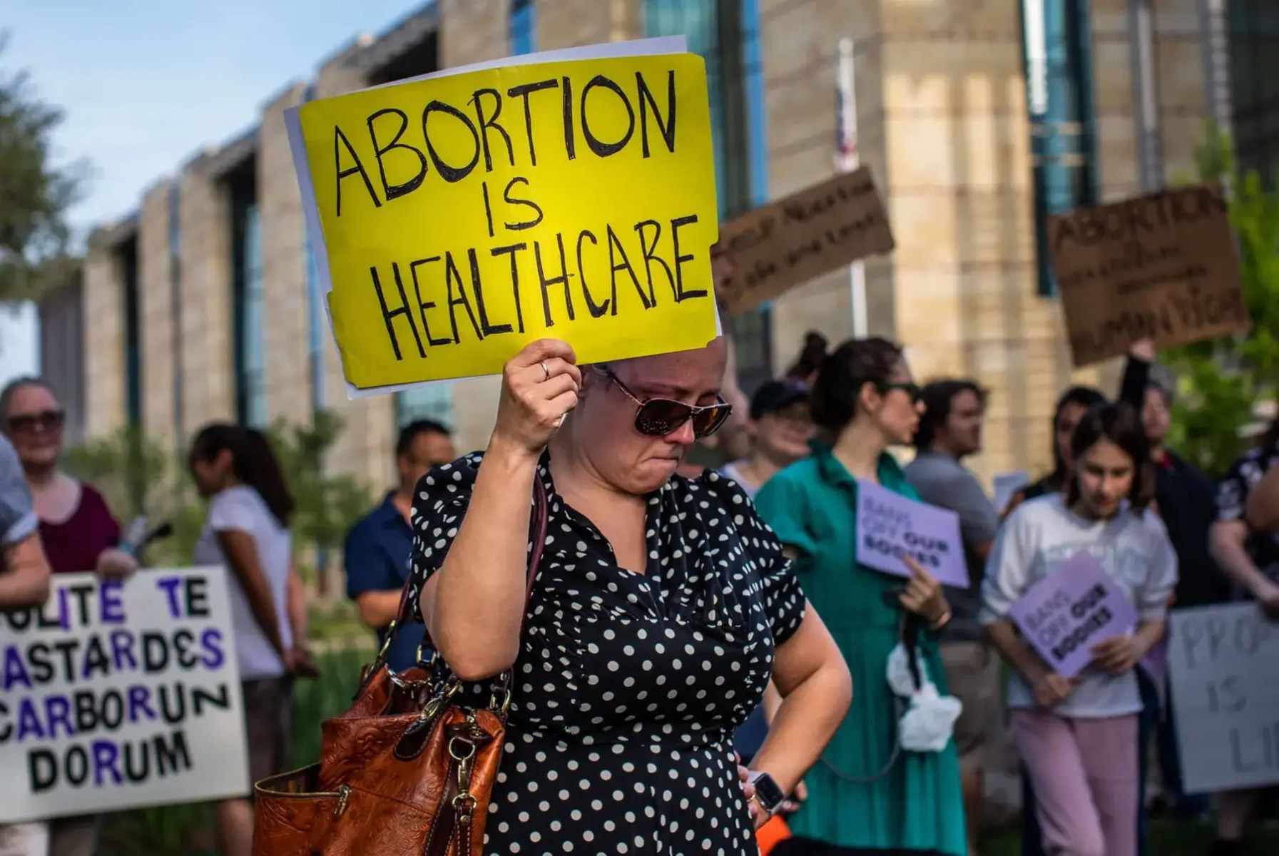 People gather for an abortion rights rally at the federal courthouse in San Antonio