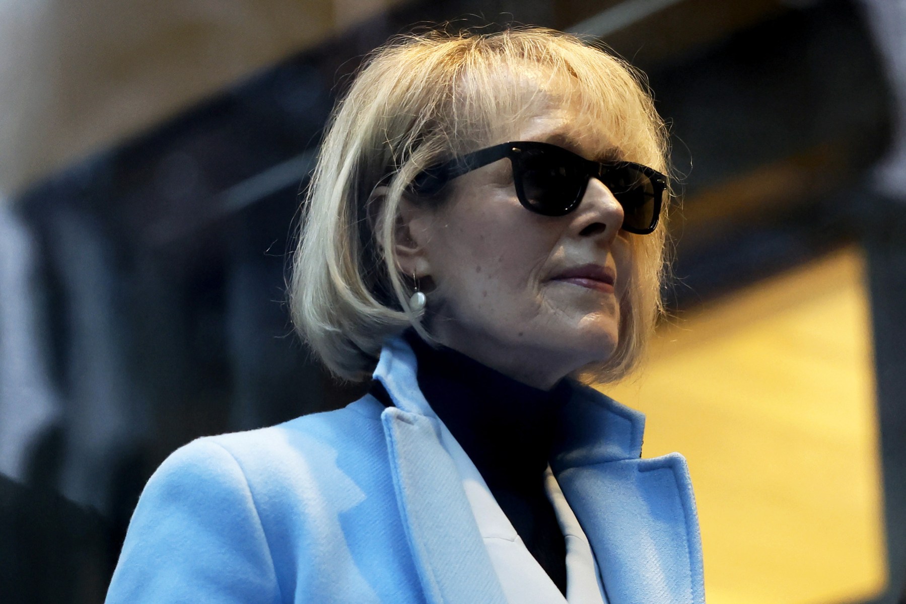 E. Jean Carroll arrives for her civil defamation trial against former President Donald Trump.