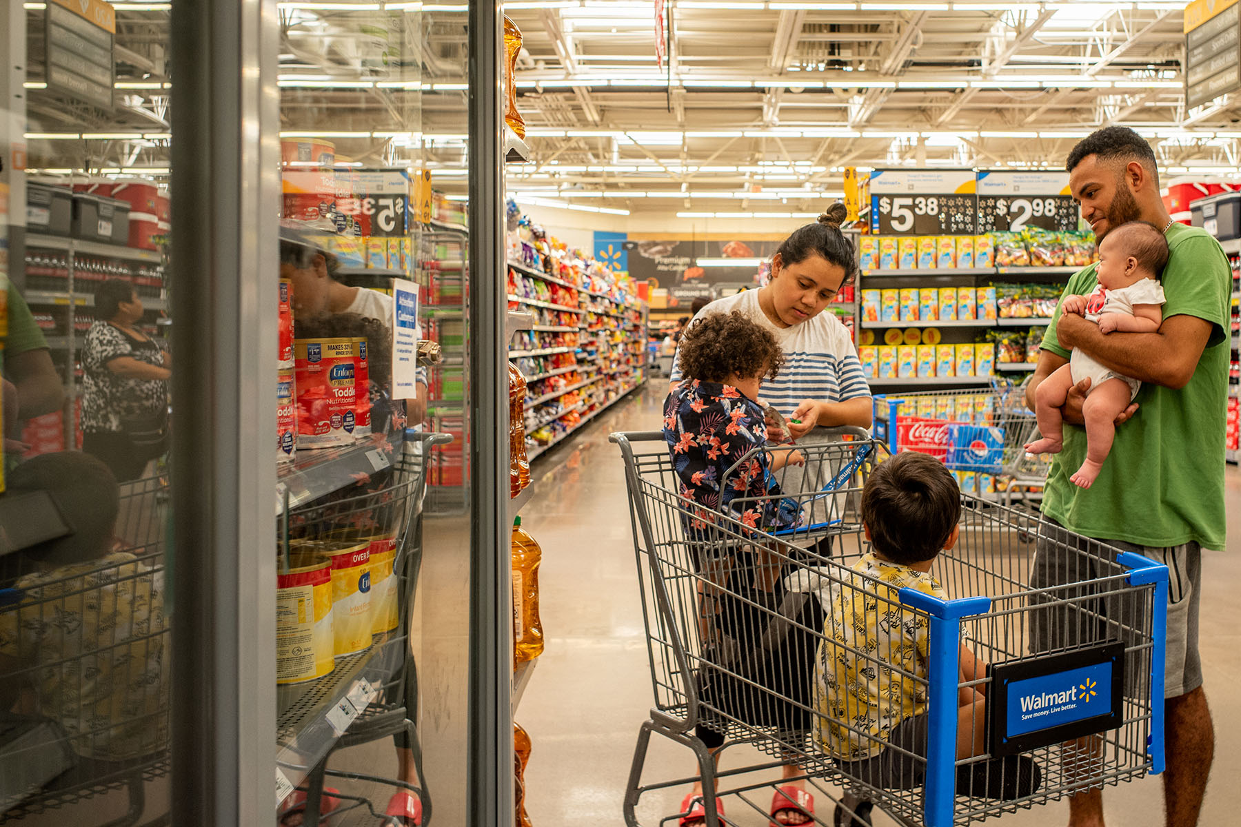 A family shops for baby formula at a Walmart Supercenter in Houston, Texas.