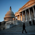 U.S. Capitol Police stand watch on the East Front at sunrise in Washington, D.C.