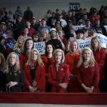 Supporters of former President Donald Trump listen while he speaks during a Get Out The Vote rally.