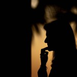 Nikki Haley's silhouette is seen at sunset at a campaign event in Beaufort, South Carolina.