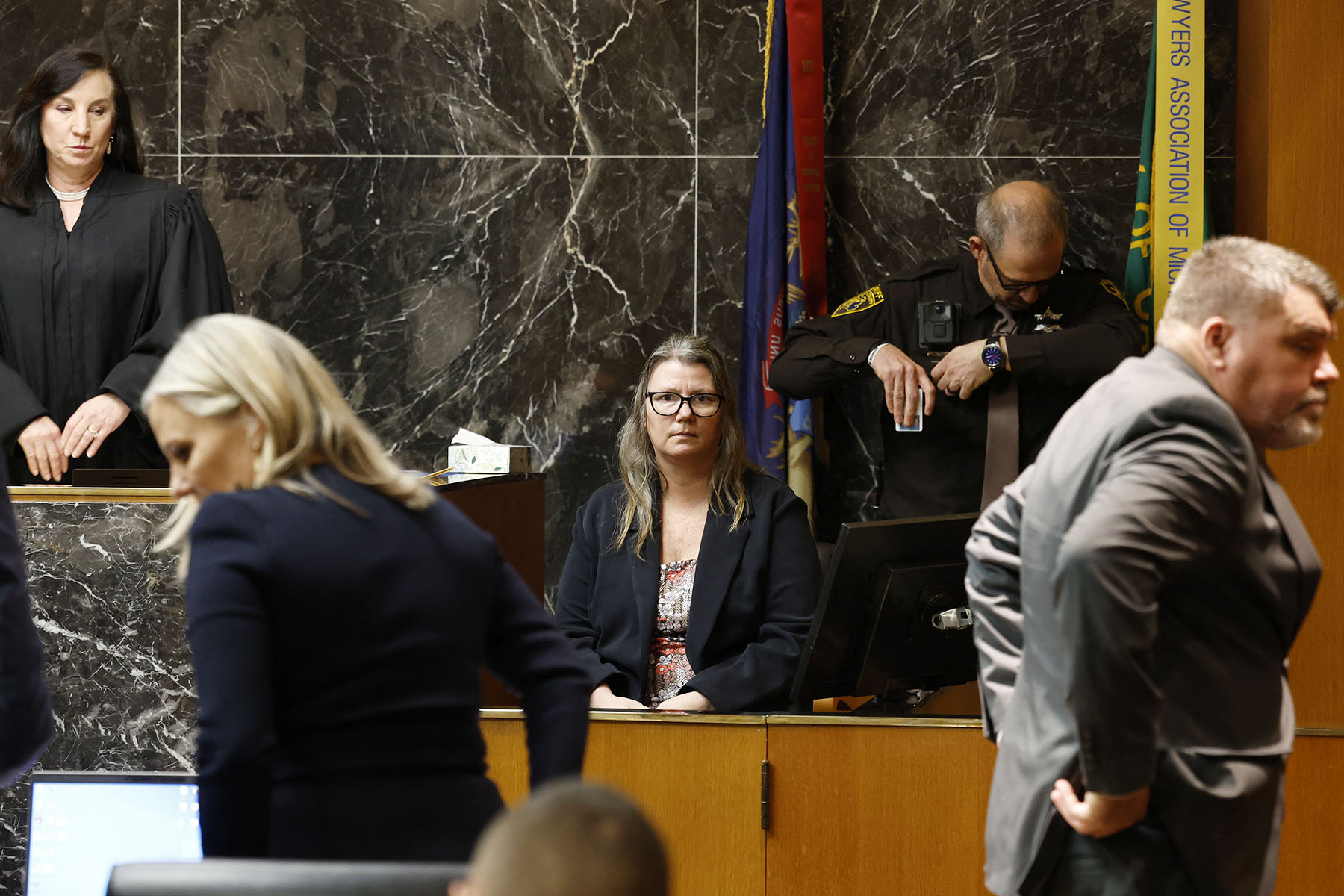 Jennifer Crumbley listens while on the stand in the courtroom of Oakland County Court.