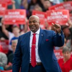 Lt. Gov. Mark Robinson waves at a crowd during a rally.