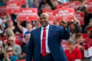 Lt. Gov. Mark Robinson waves at a crowd during a rally.