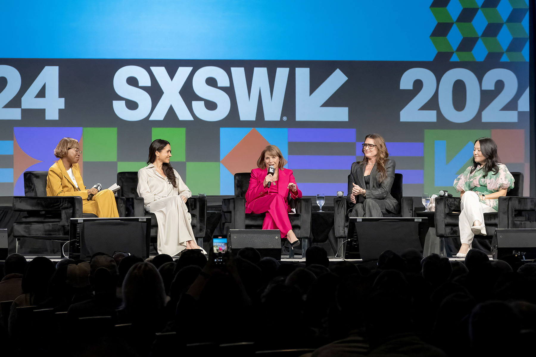 Errin Haines, Meghan, Duchess of Sussex, Katie Couric, Brooke Shields and Nancy Wang Yuen speak onstage.