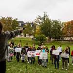 Protesters chant in support of sexual assault survivors at Indiana University