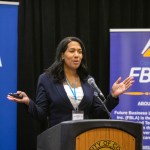 Taliyah Murphy is seen speaking at a podium at a conference she participated in.