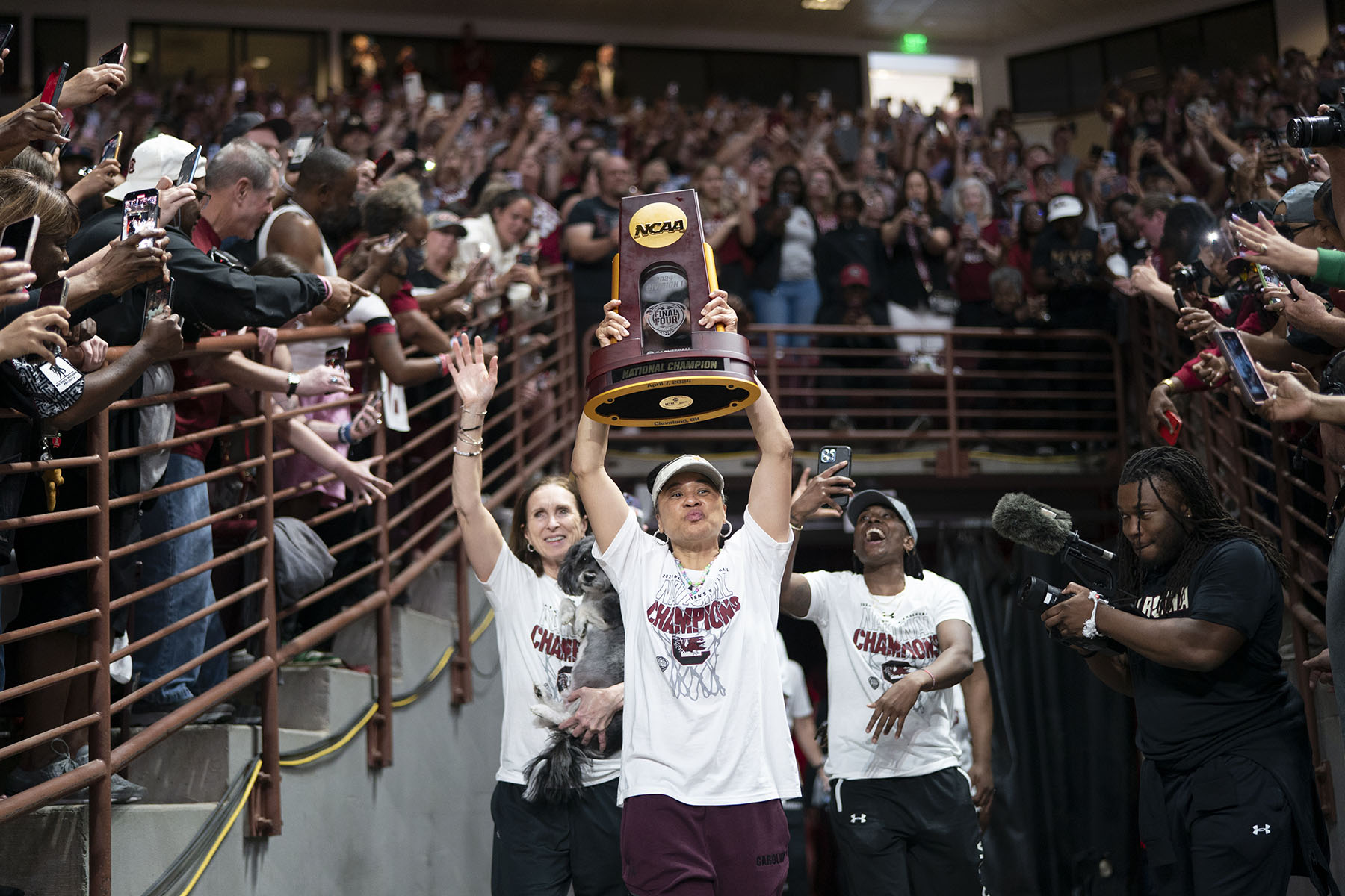 South Carolina coach Dawn Staley raises the NCAA Women's Basketball Championship trophy at a celebration at the Colonial Life Arena, in Columbia, South Carolina.