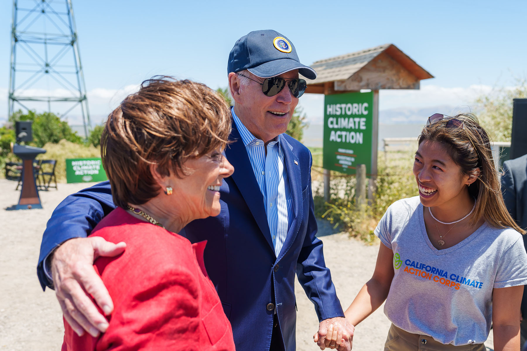 President Joe Biden greets environmental student Chiena Ty at an event on climate resilience at Baylands Nature Preserve.