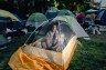 Juan, a 21-year-old junior student from Las Vegas, poses for a portrait in his camp at University Yard on the George Washington University campus in Washington, DC, on Wednesday, May 1, 2024.