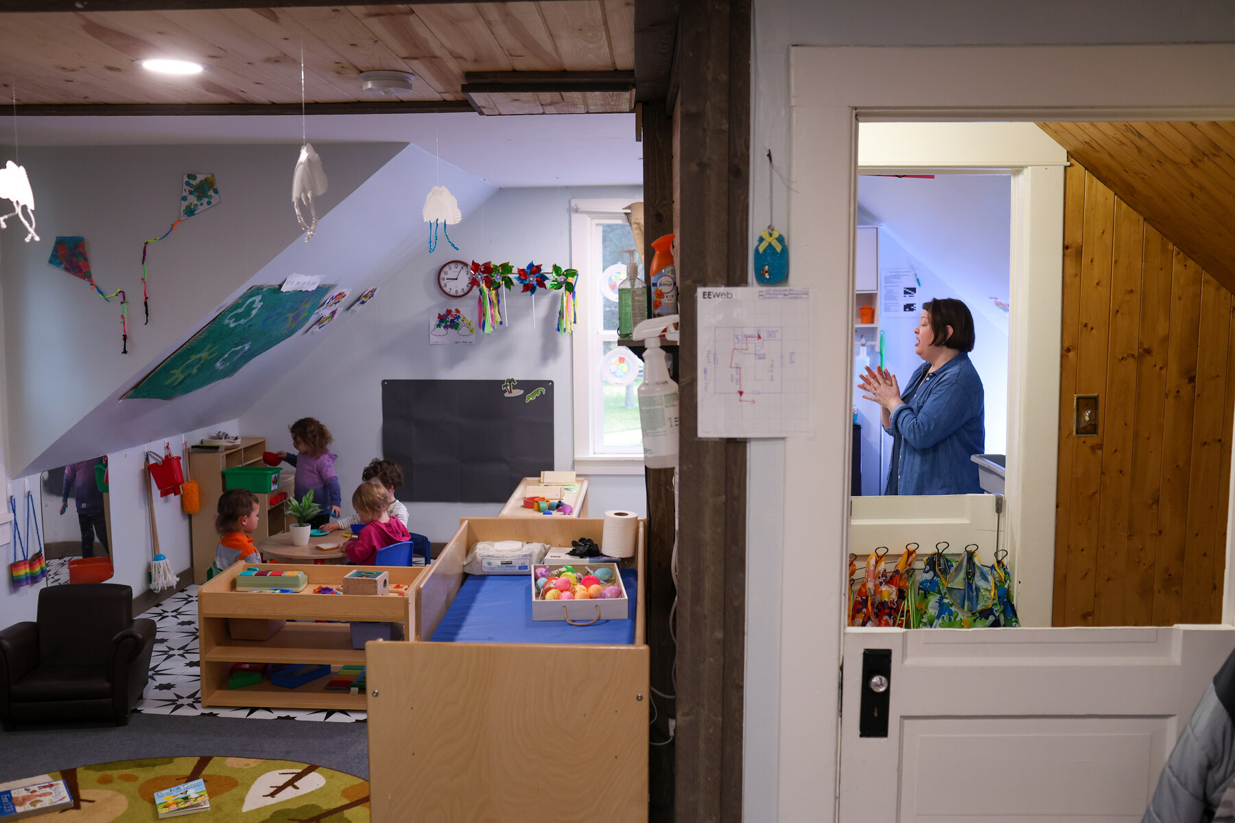 A teacher looks over her students in a classroom.