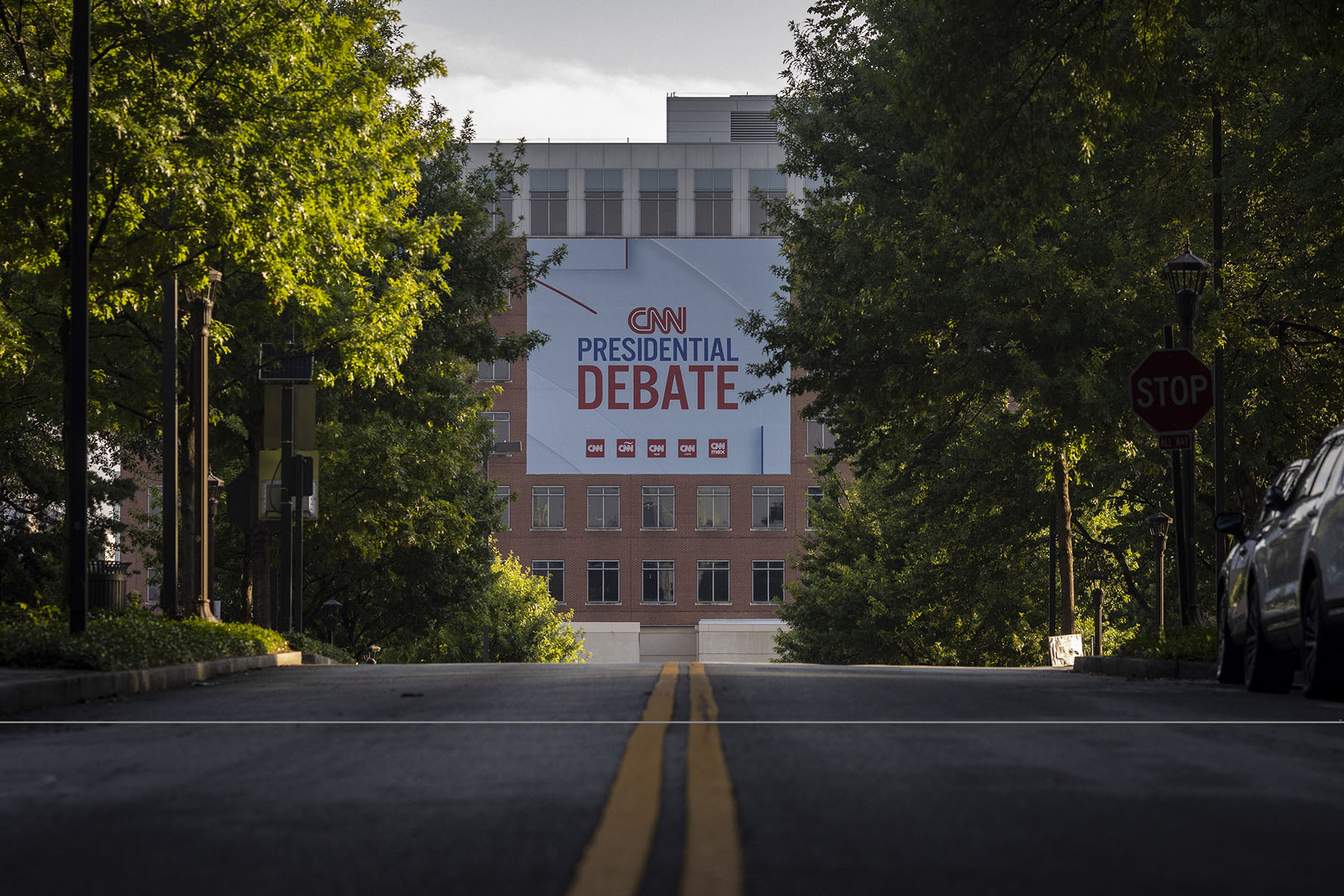 Banners are placed outside of CNN studios ahead of the first presidential debate in Atlanta, Georgia on June 24, 2024. The Banner reads "CNN Presidential Debate."