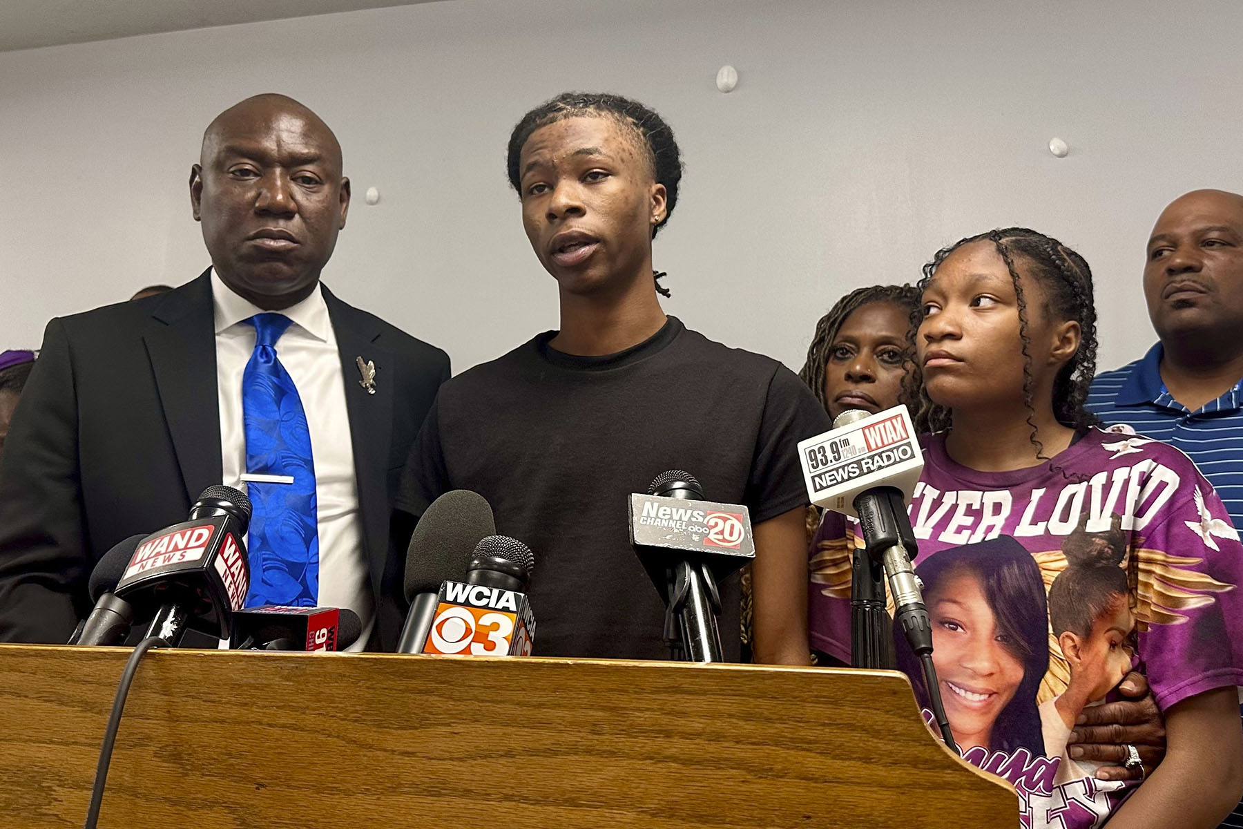 Malachi Hill Massey, flanked by civil right attorney Ben Crump and Sonya Massey's daughter, Jeanette Summer Massey, speaks at a news conference at the NAACP headquarters.