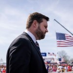 JD Vance arrives at a rally hosted by former President Donald Trump.