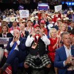 Attendees listen to speakers on the fourth day of the Republican National Convention.