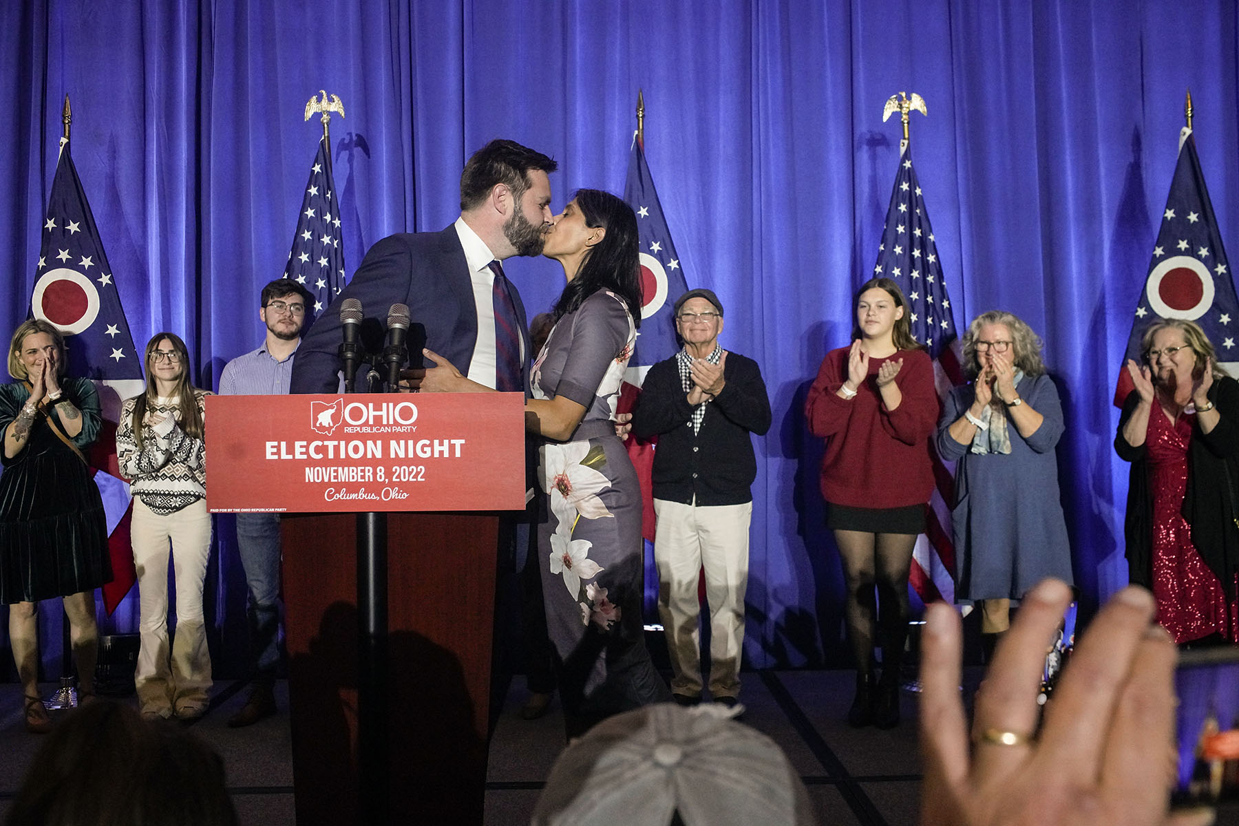 JD Vance kisses wife Usha Vance on stage at an election watch party.