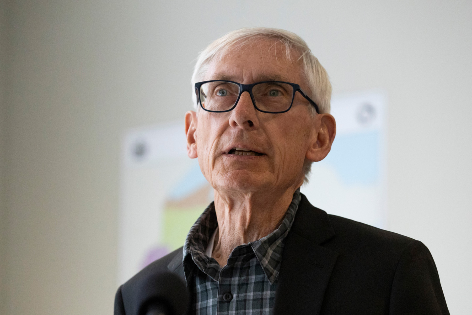 Gov. Tony Evers holds a press conference at the Democratic Party of Wisconsin offices.