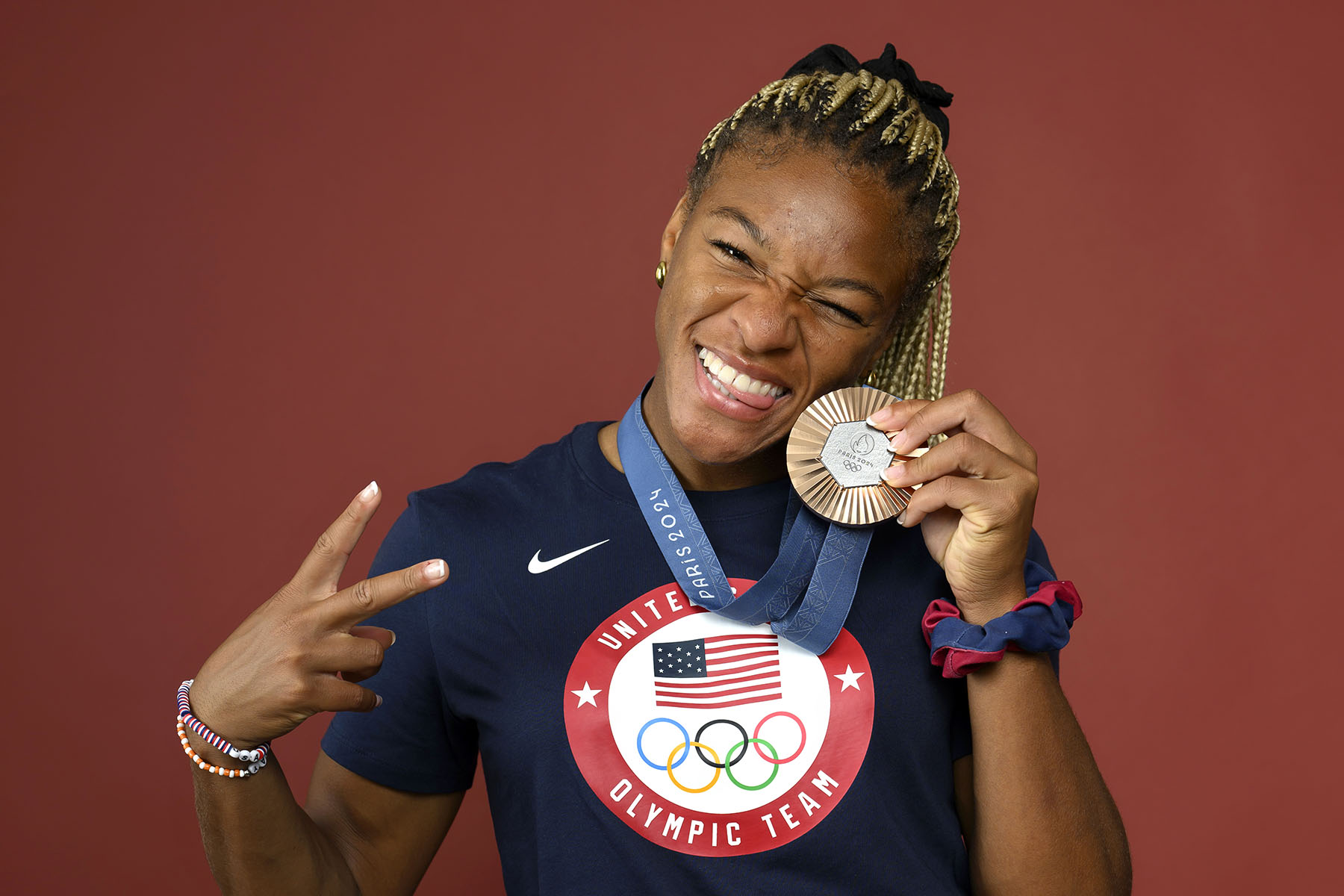 Ariana Ramsey poses with her Olympic medal.