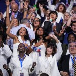 Attendees cheer during the final day of the Democratic National Convention at the United Center on August 22, 2024 in Chicago, Illinois.