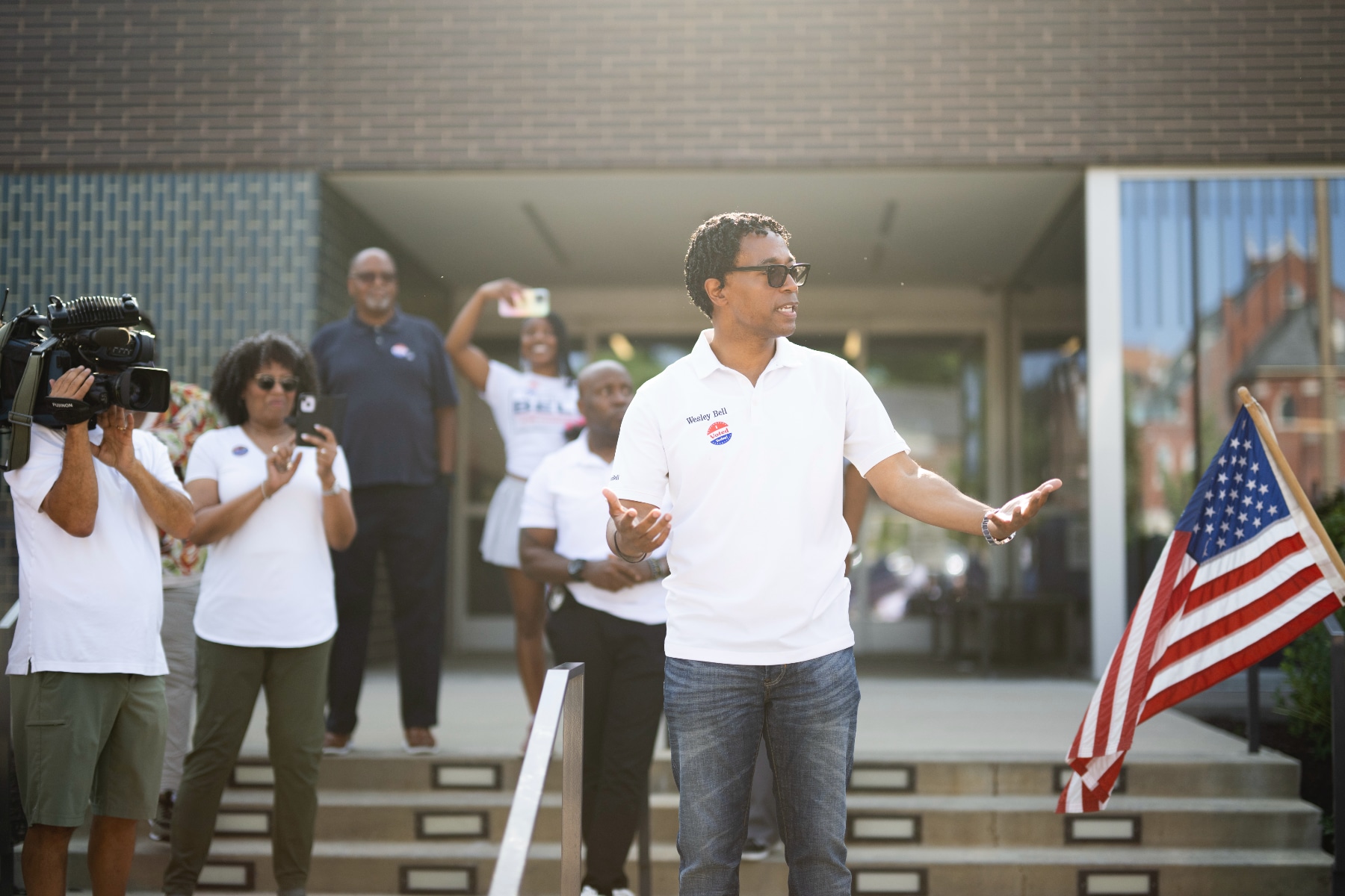 Wesley Bell speaks to supporters outside Mid County Branch Library in Clayton, Missouri