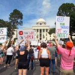 Protesters rally for abortion rights on the Alabama Capitol steps.