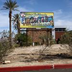 A billboard reads, 