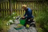 A farmer works on her farm.