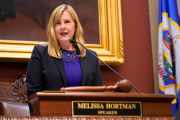 State Rep. Melissa Hortman, wearing a dark blazer and purple shirt, addressing the Minnesota Legislature as speaker in 2023.
