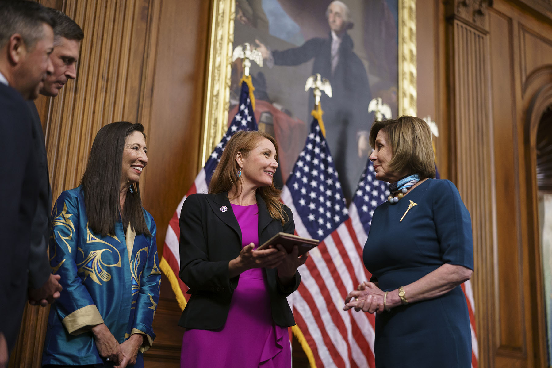 House Speaker Nancy Pelosi (right) holds a swearing-in ceremony for Rep. Melanie Stansbury, (center) at the Capitol.