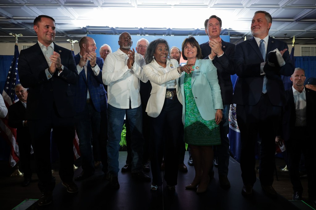 Republican Virginia gubernatorial candidate Winsome Earle-Sear waves to supporters during a campaign event.